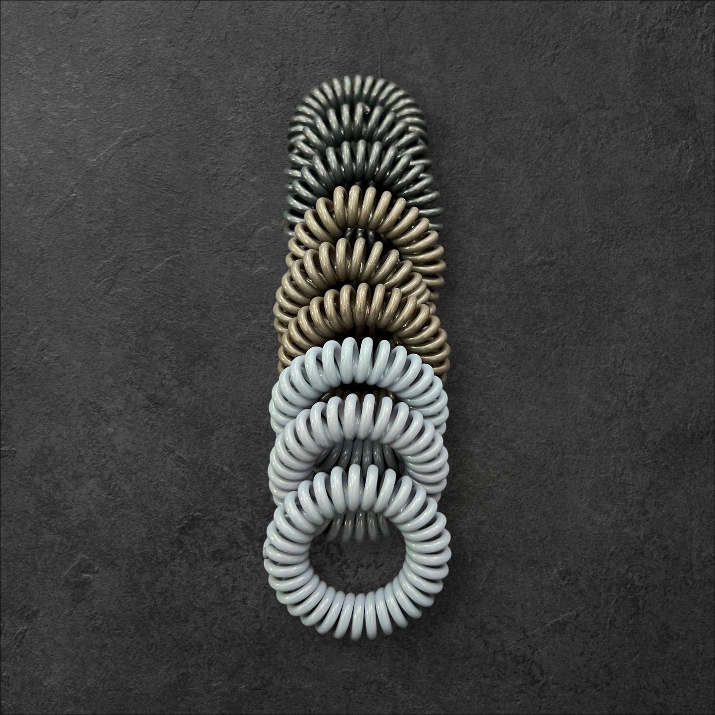 Spiral Hair Tie Set – 9pcs Anti-Tangle Hair Coils (Multiple Colors) at Wholesale Prices