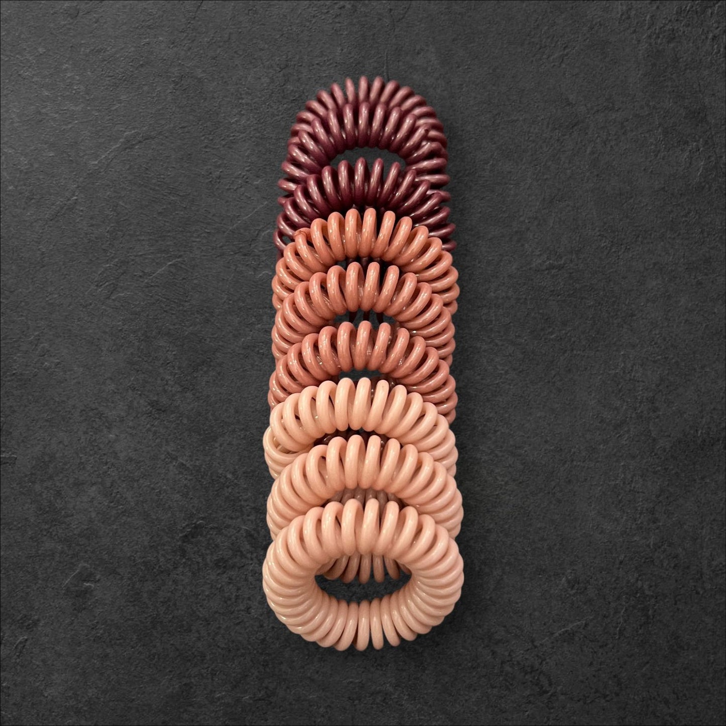 Spiral Hair Tie Set – 9pcs Anti-Tangle Hair Coils (Multiple Colors) at Wholesale Prices